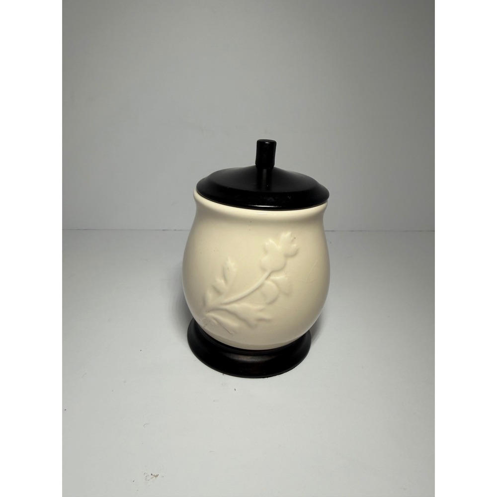 Cream Ceramic Jar with Embossed Floral Vine and Dark Brown Lid and Base